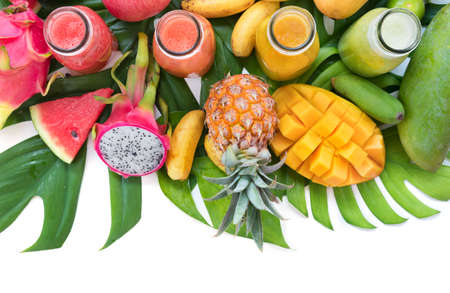 Tropic flat lay top view tropical colorful fruitsの写真素材