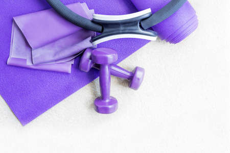 Fitness yoga pilates equipment props on a carpet