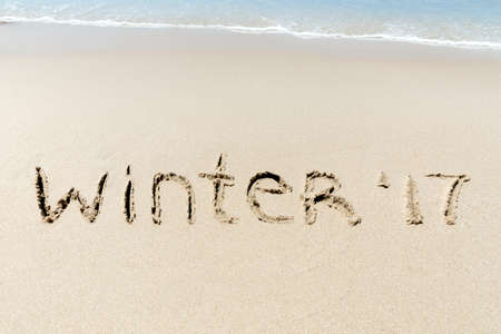 Winter 2017 sign on a white sand near sea ocean tropic beachの写真素材