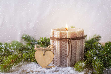 knitted candle with fir tree for traditional Christmas decorationの写真素材