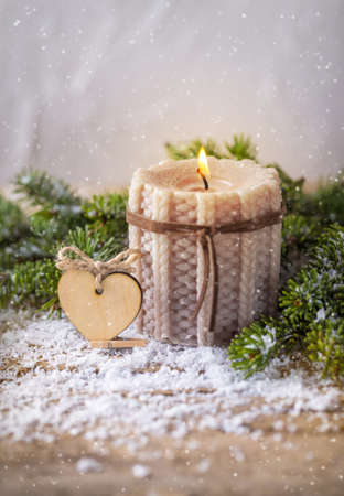 knitted candle with fir tree for traditional Christmas decorationの写真素材