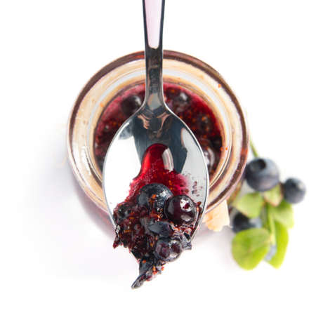 Blueberry homemade jam on a white backgroundの写真素材