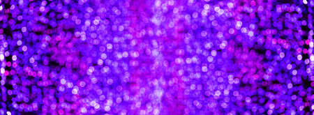 Blur bokeh purple, violet unfocused Christmas lights textured backgroundの写真素材