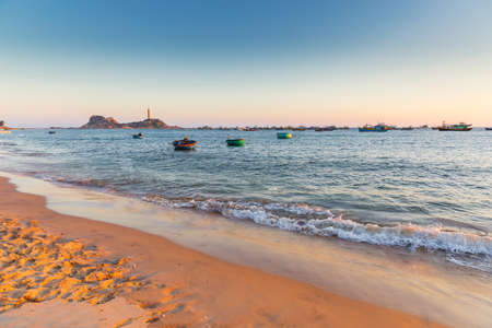 Vietnam Mui Ne village fishing boats and ships in sunset lightsの写真素材