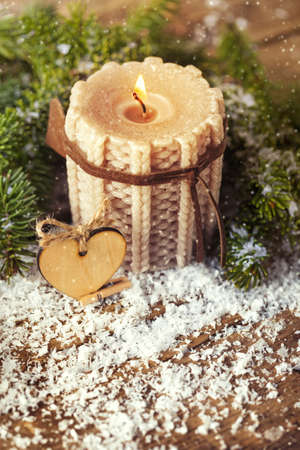 knitted candle with fir tree for traditional Christmas decorationの写真素材
