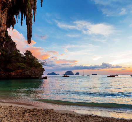 Popular tropical karst rocks perfect for climbing Phra Nang Cave Beach in sunset, Railay, Krabi province, Thailandの写真素材