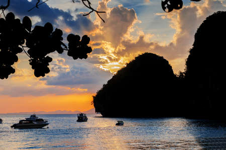 Popular tropical karst rocks perfect for climbing Phra Nang Cave Beach in sunset, Railay, Krabi province, Thailandの写真素材