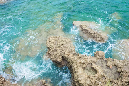 Idillic Bali coral ocean coast with turquoise waterの写真素材