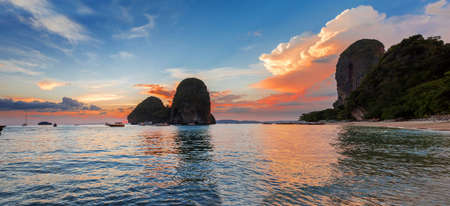 Popular travel tropical karst rocks perfect for climbing Phra Nang Cave Beach in sunset, Krabi province, Thailandの写真素材