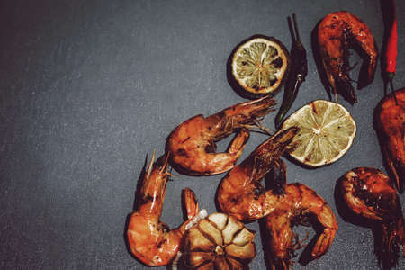 Fresh grilled prawn shrimps on a grey backgroundの写真素材