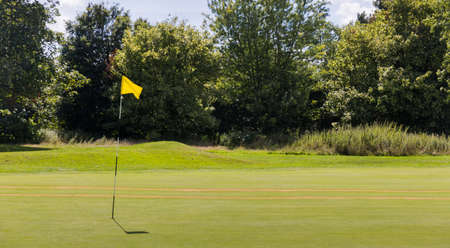 Beautiful golf fields with green grassの写真素材
