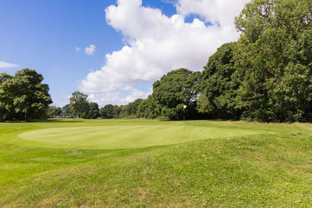 Beautiful golf fields with green grassの写真素材