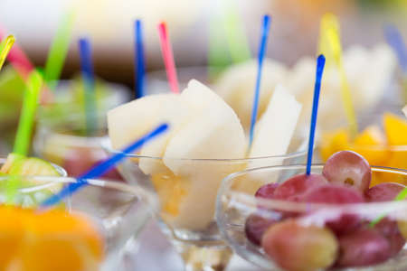 Cuts of fruits in glass for partyの写真素材