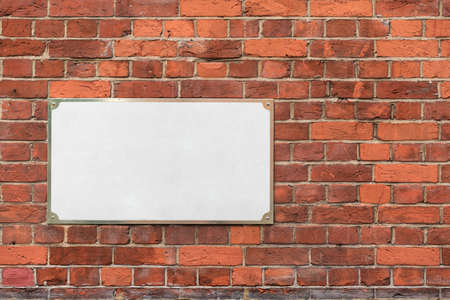 Mock up with empty blank white address sign on a brick wallの写真素材