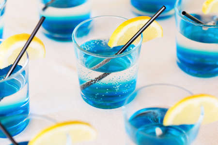 Row of blue shot drinks