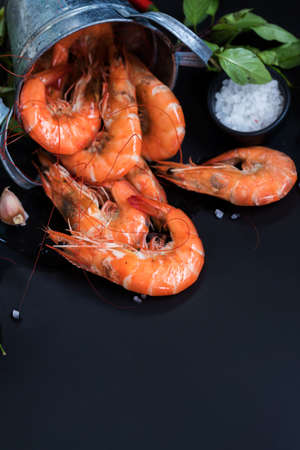 Perfect cooked prawns shrimps with herbs, spices and text spaceの写真素材