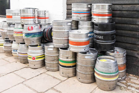 StAlbas, United Kingdom - 27 July 2017: A lot of Beer kegs near old British pub