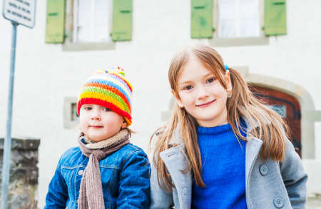 Outdoor portrait of cute childrenの写真素材
