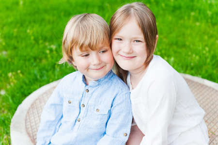 Adorable children playing together on a nice summer day, outdoorsの写真素材