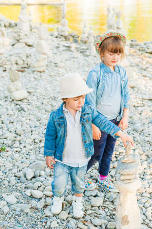 Adorable children playing outdoorsの写真素材