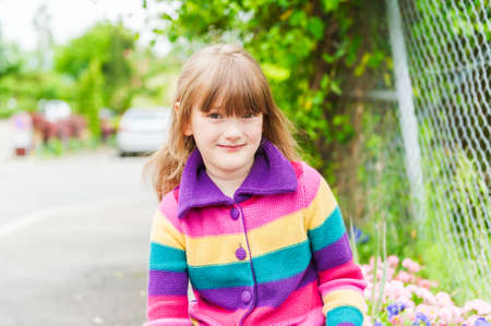 Outdoor portrait of a cute little girlの写真素材