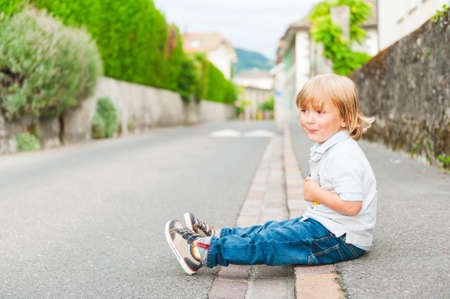 Outdoor portrait of adorable toddler boyの写真素材