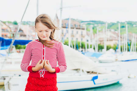 Outdoor portrait of a cute little girlの写真素材