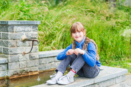 Outdoor portrait of a cute little girlの写真素材
