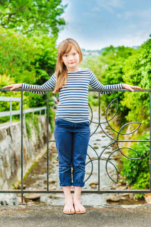 Outdoor portrait of a cute little girlの写真素材