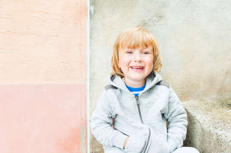 Outdoor portrait of a cute toddler boyの写真素材