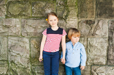 Outdoor portrait of two adorable childrenの写真素材
