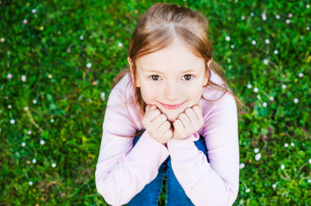 Outdoor portrait of a cute little girlの写真素材