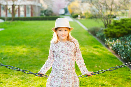 Adorable little girl taken closeup outdoors in springの写真素材