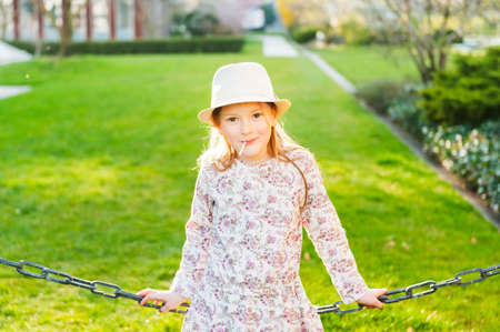 Adorable little girl taken closeup outdoors in springの写真素材