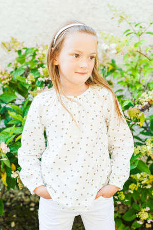 Outoor portrait of a cute little girlの写真素材
