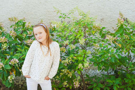 Outoor portrait of a cute little girlの写真素材