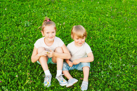 Outdoor portrait of adorable kidsの写真素材