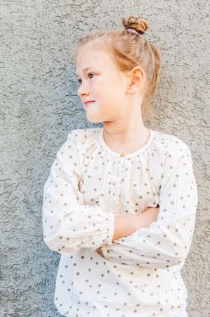 Outdoor portrait of a cute little girlの写真素材