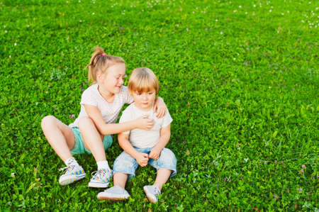 Outdoor portrait of adorable kidsの写真素材