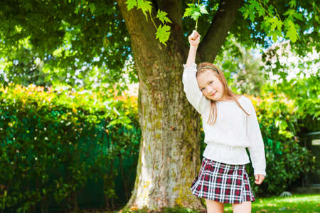 Outdoor portrait of a cute little girlの写真素材