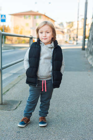 Outdoor portrait of a cute little boyの写真素材