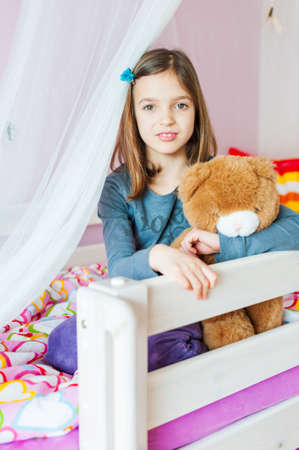 Portrait of adorable little girl in her roomの写真素材