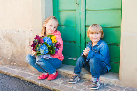 Outdoor portrait of fashion kidsの写真素材