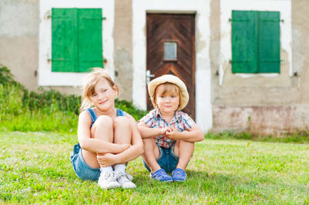 Adorable children resting in a countrysideの写真素材