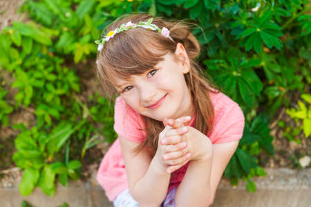 Summer portrait of a cute little girlの写真素材