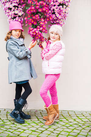 Outdoor portrait of adorable little girlsの写真素材