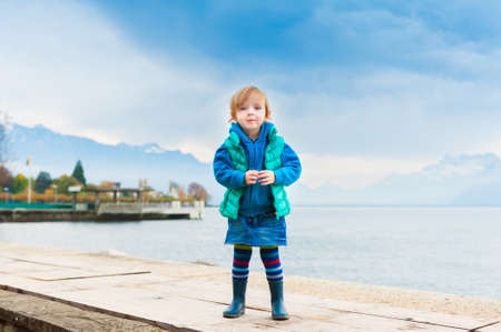 Outdoor portrait of adorable toddler girlの写真素材
