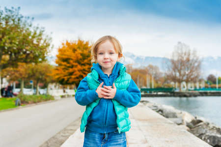 Outdoor portrait of adorable toddler girlの写真素材