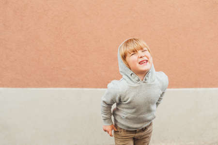 Fashion portrait of adorable toddler boyの写真素材