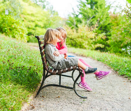 Outdoor portrait of adorable childrenの写真素材